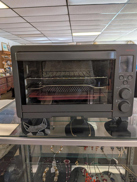 Compact Black Toaster Oven with Multiple Functions
